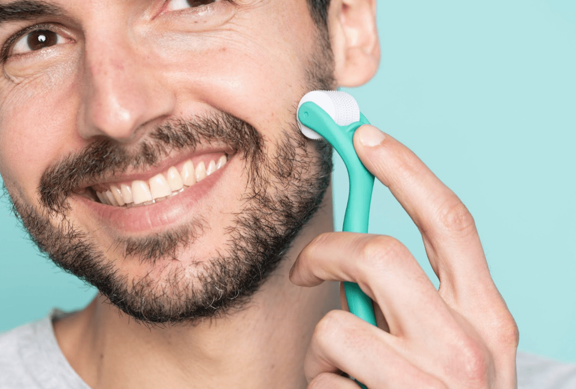 Man shaving beard